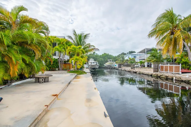 a view of a lake with a building in the background