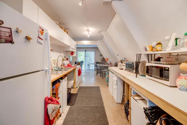 a kitchen with stainless steel appliances granite countertop lots of counter top space