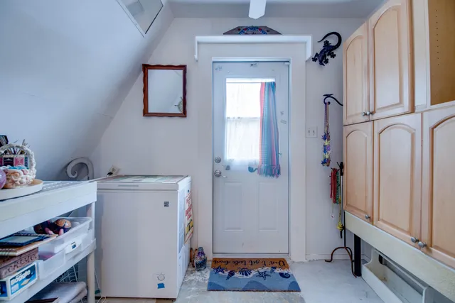 a room with storage and utility