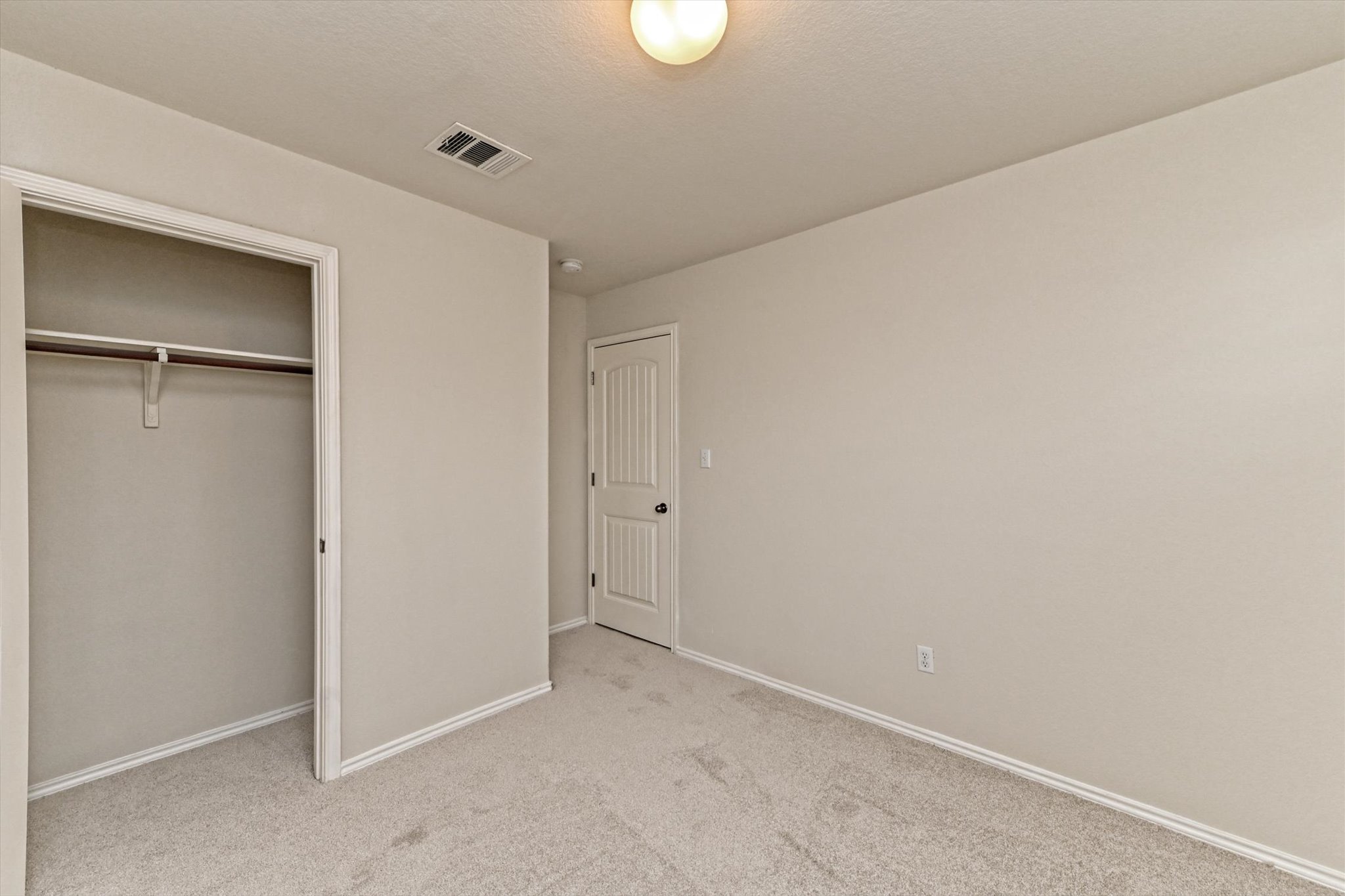 31 Stone Terrace Drive Austin, TX 78734 - Photo 23 of 29 Unfurnished bedroom with carpet and a closet