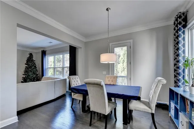 a living room with furniture flat screen tv and a fireplace