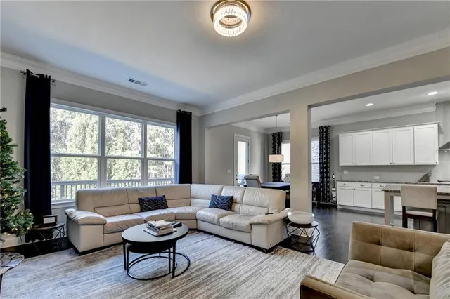 a large bathroom with a large tub shower and sink