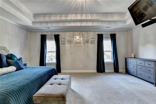 a bathroom with a toilet a sink and a mirror