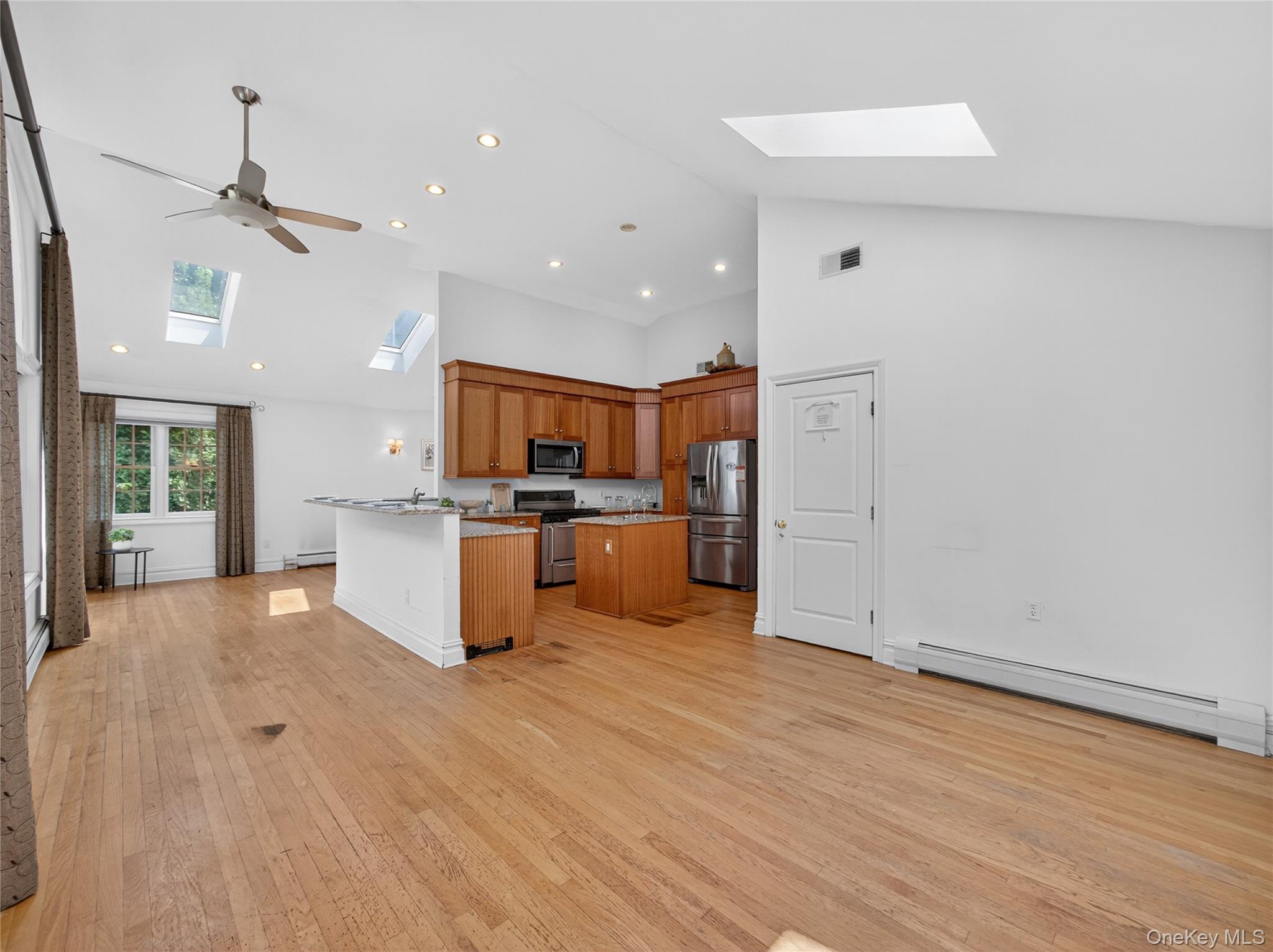 516 Oak Tree Road Palisades, NY 10964 - Photo 37 of 38 a view of kitchen with wooden floor and electronic appliances