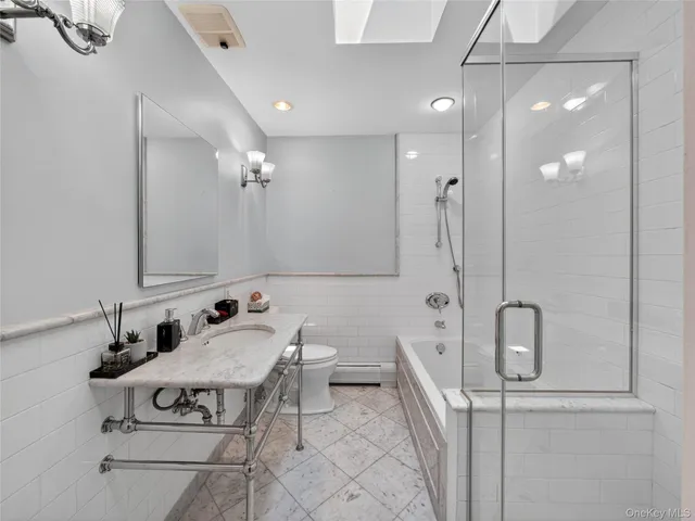 a kitchen with granite countertop sink and window