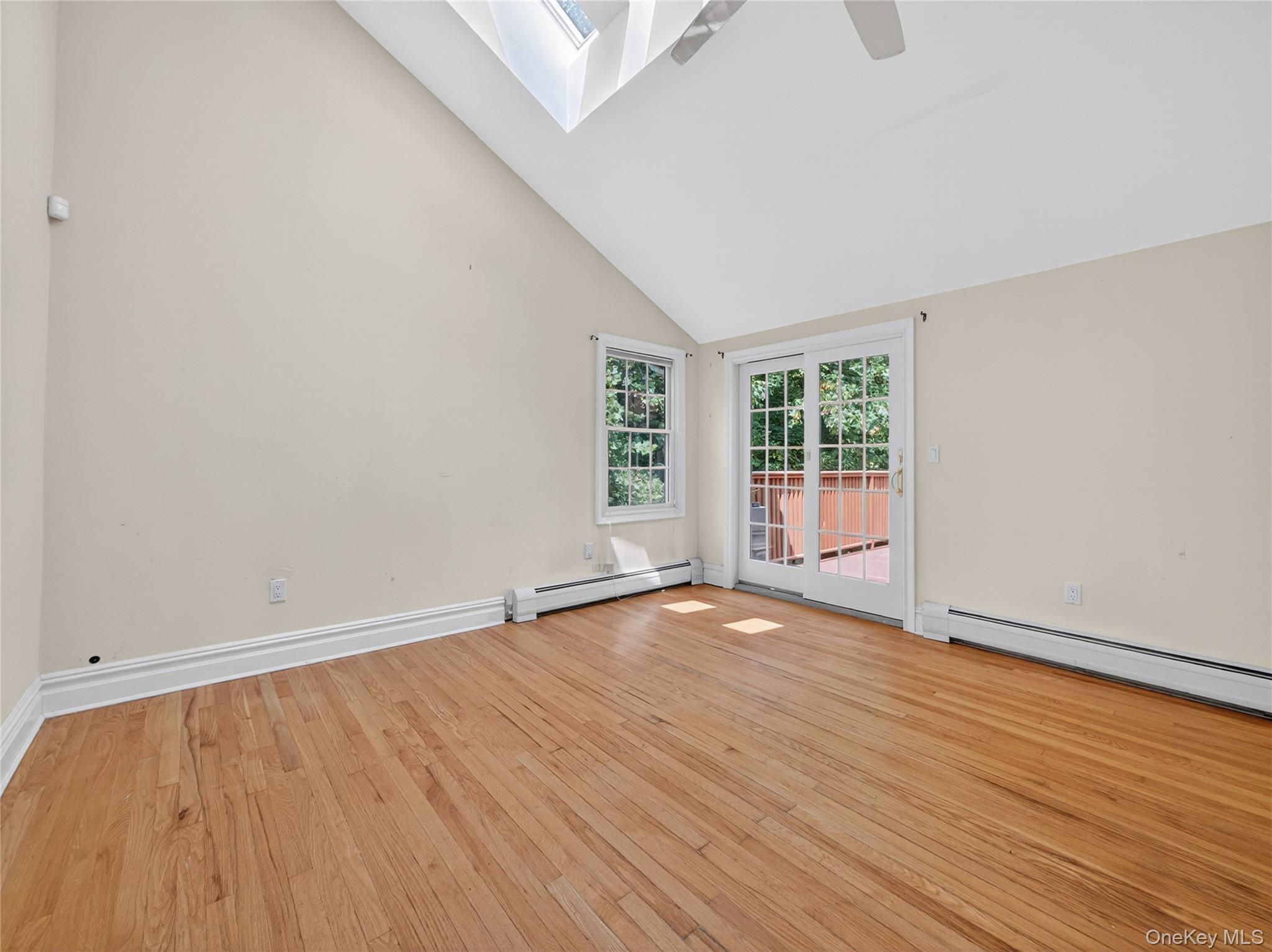516 Oak Tree Road Palisades, NY 10964 - Photo 20 of 38 wooden floor in an empty room with a window