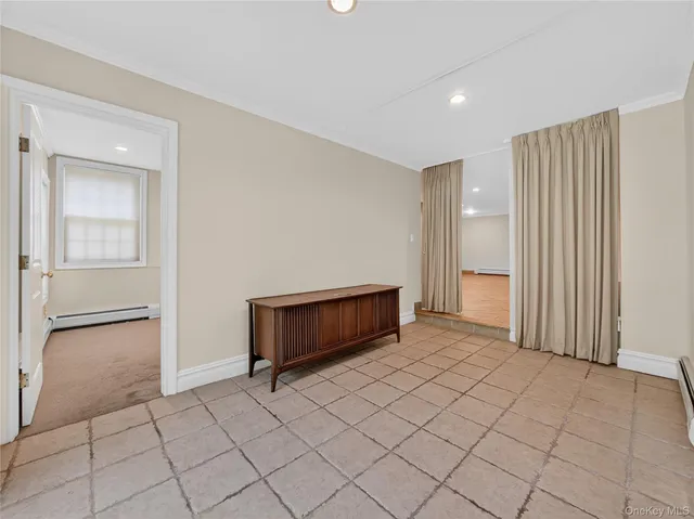 a view of a room with windows