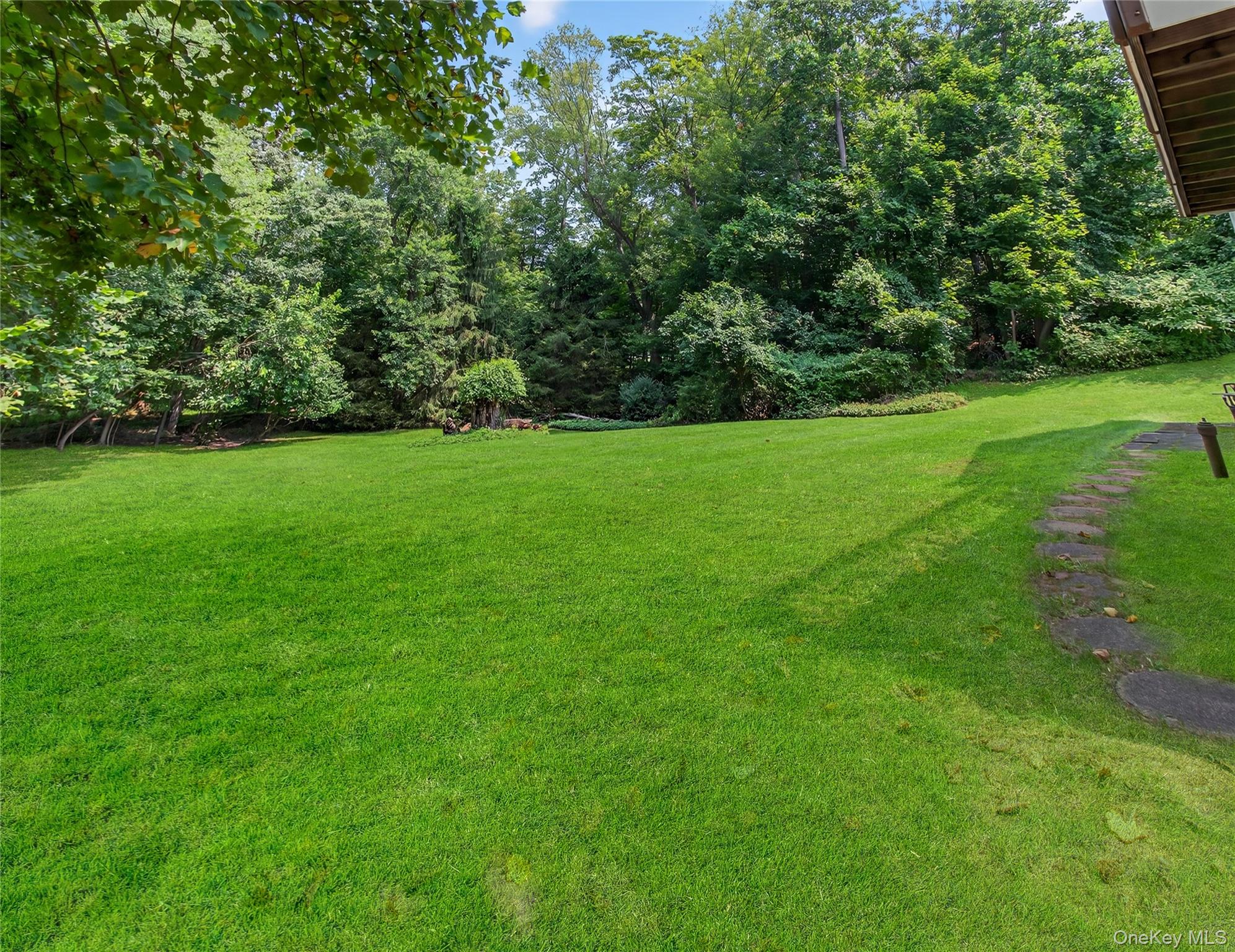 516 Oak Tree Road Palisades, NY 10964 - Photo 33 of 38 a view of field with trees in the background