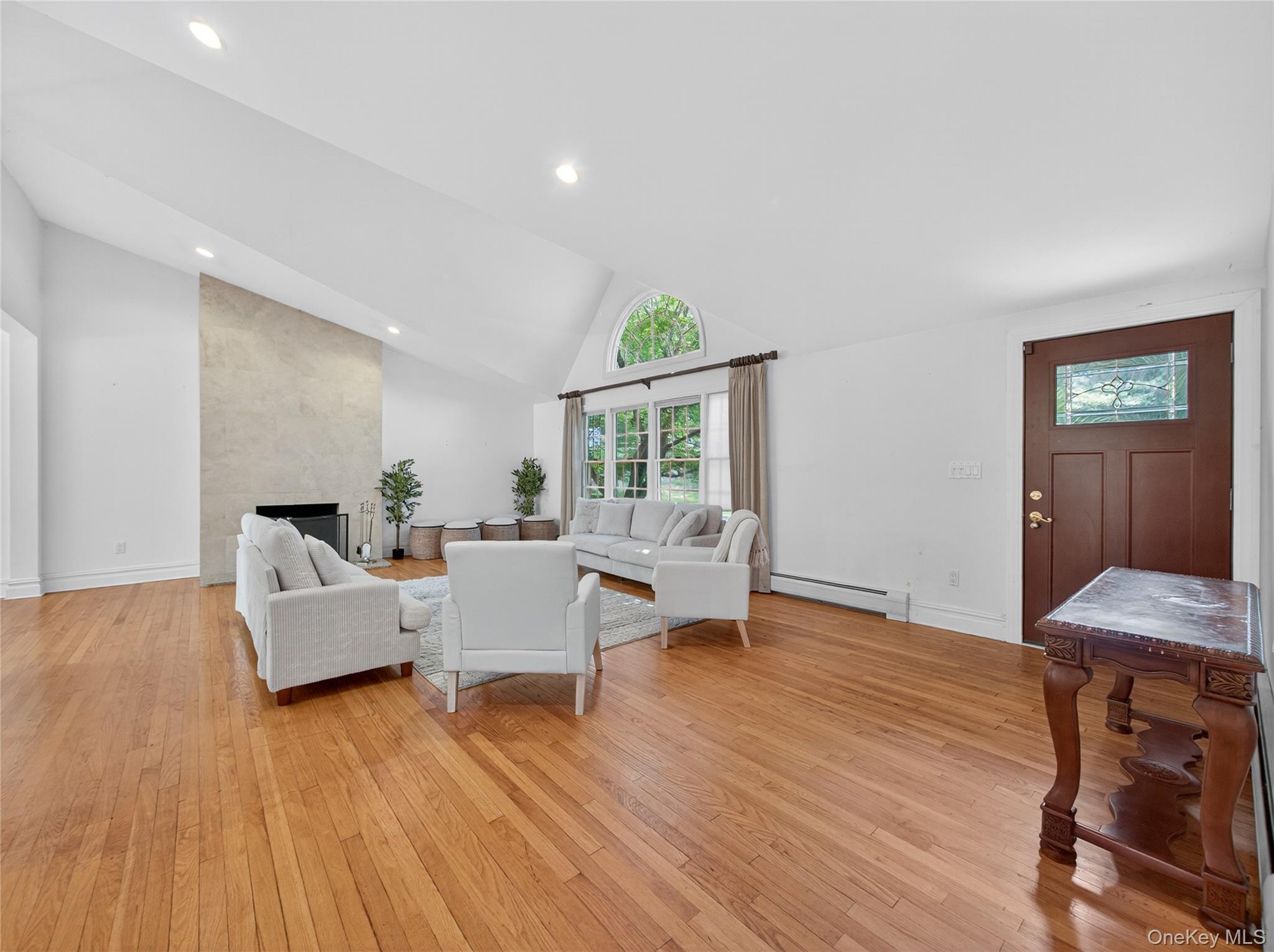 516 Oak Tree Road Palisades, NY 10964 - Photo 6 of 38 a living room with furniture and wooden floor