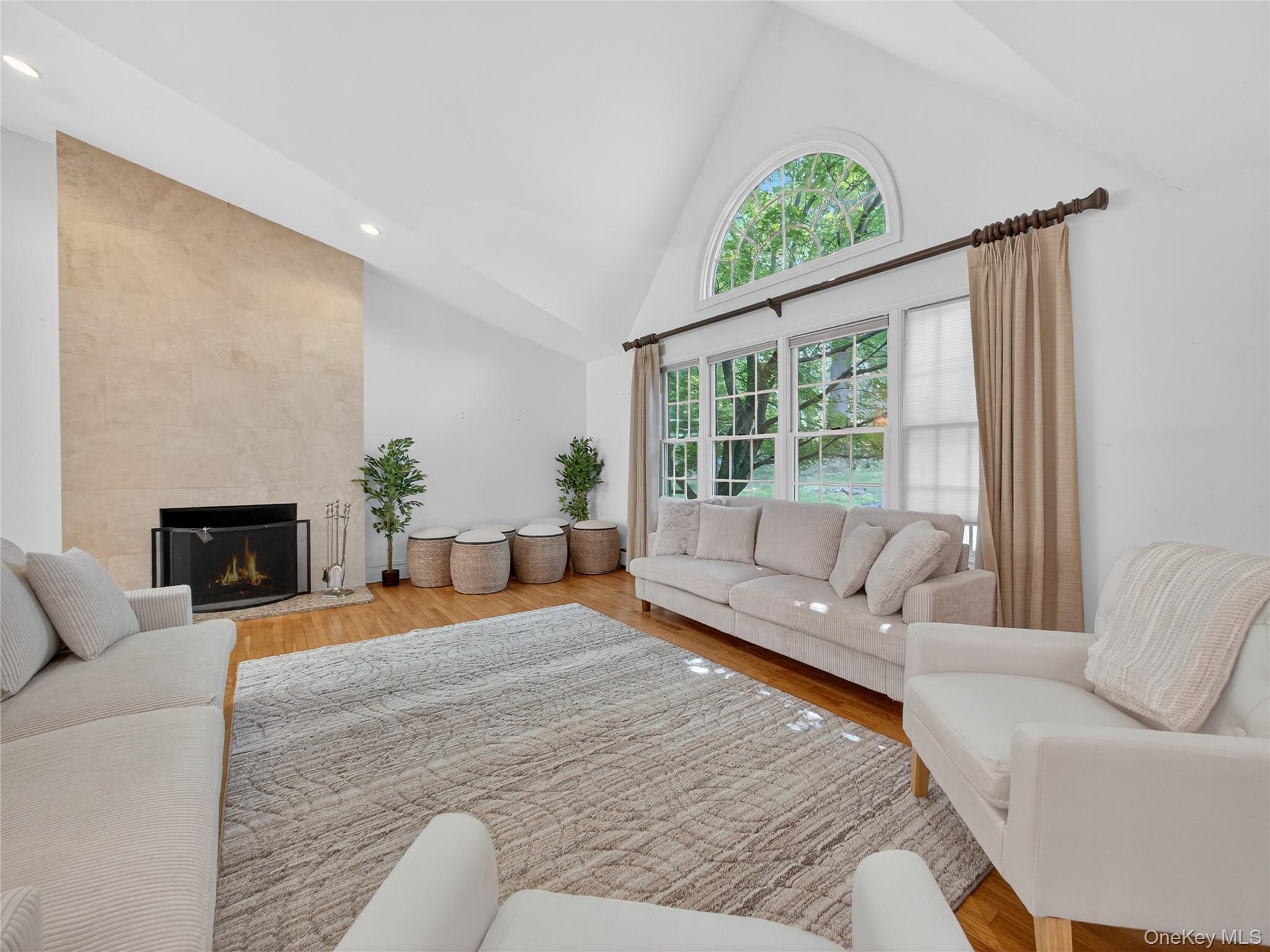 516 Oak Tree Road Palisades, NY 10964 - Photo 7 of 38 a living room with furniture and a large window