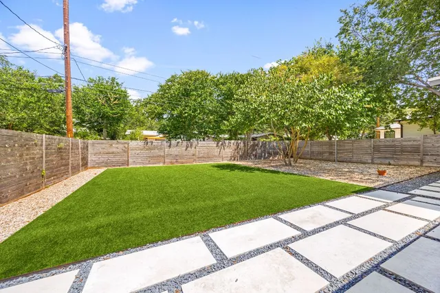 a view of a backyard with a garden