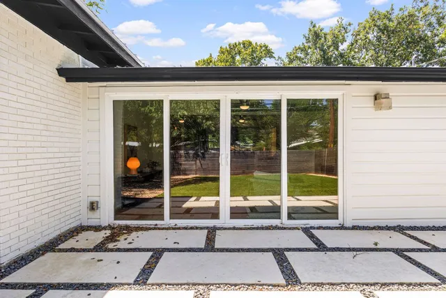 a view of backyard with cabin
