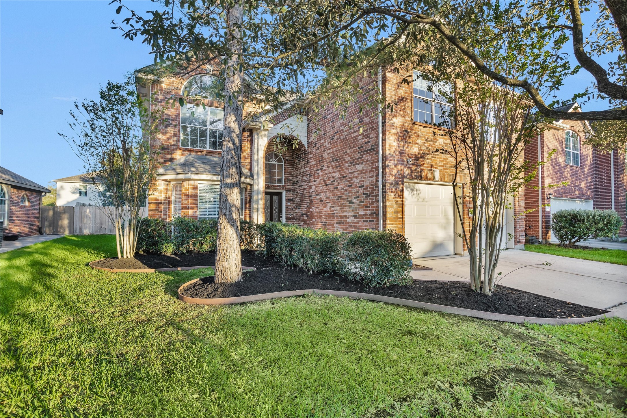 30110 Legends Ridge Drive Spring, TX 77386 - Photo 1 of 49 a view of a building with a yard and large trees