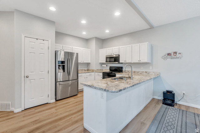 11007 Birch Creek Road South Jordan, UT 84095 - Photo 4 of 35 Large granite breakfast bar is a great place to gather