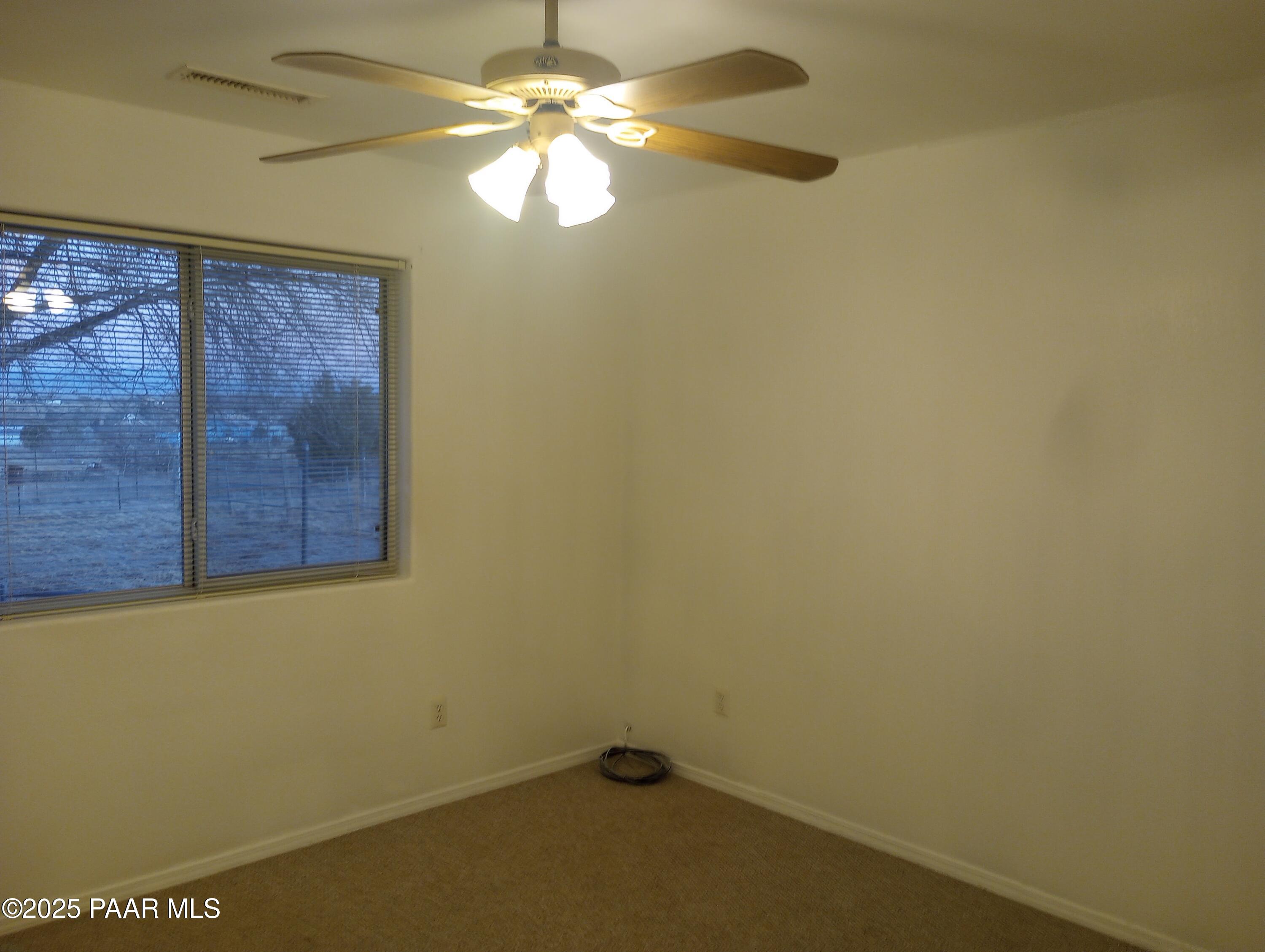 3325 Gopher Drive Chino Valley, AZ 86323 - Photo 11 of 19 a view of a small space with a fan