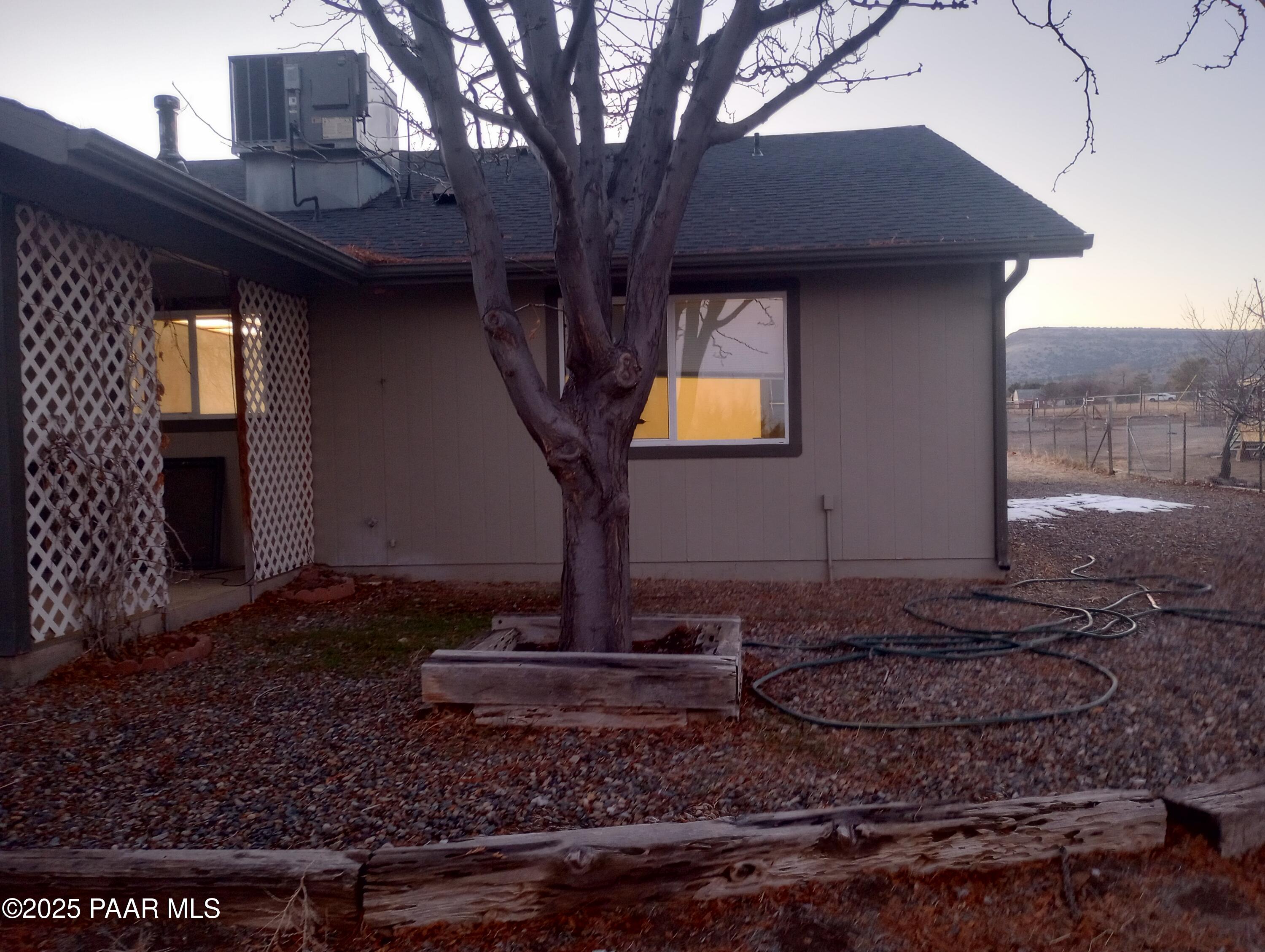 3325 Gopher Drive Chino Valley, AZ 86323 - Photo 14 of 19 a view of a house with a yard