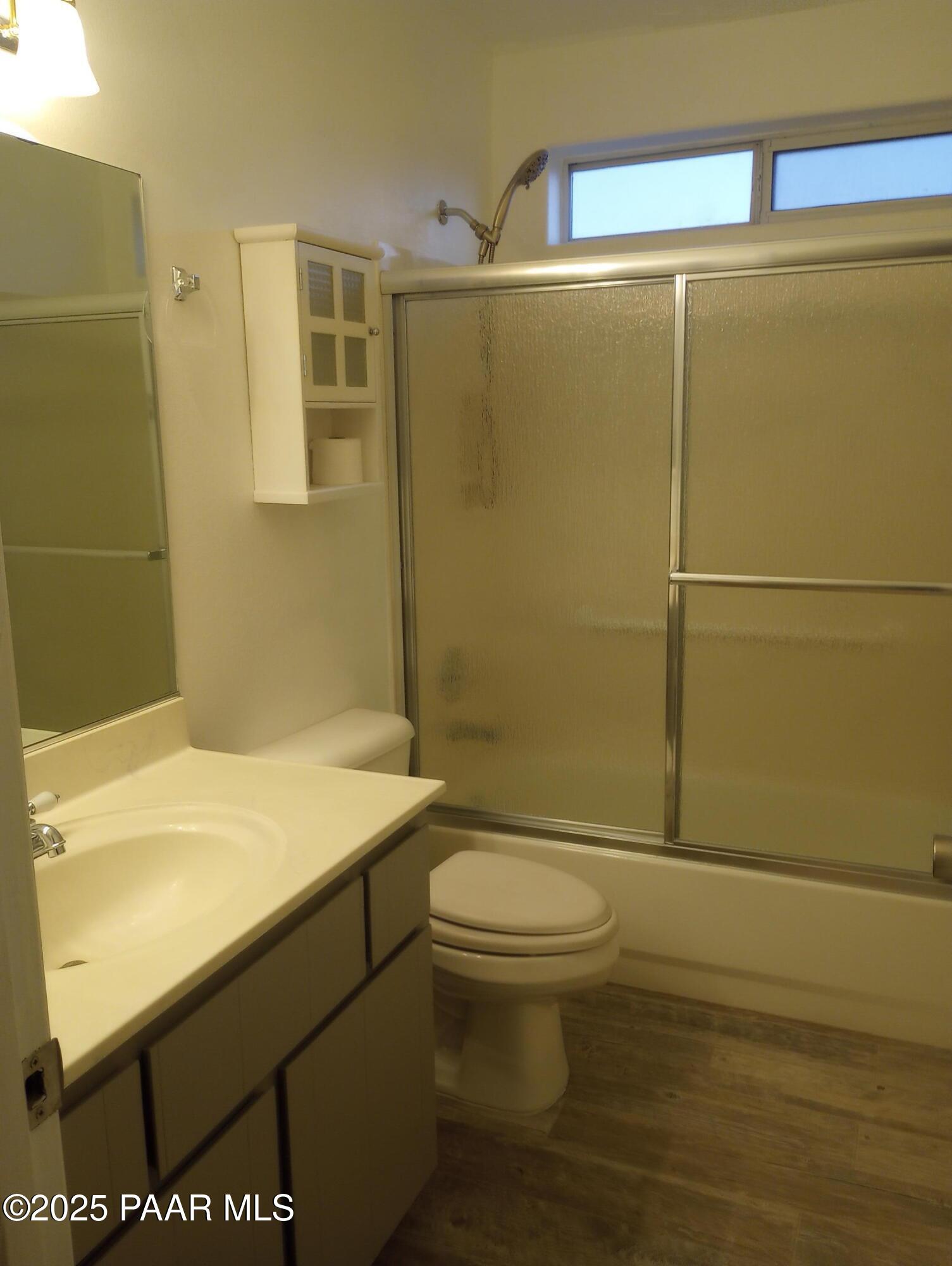 3325 Gopher Drive Chino Valley, AZ 86323 - Photo 10 of 19 a bathroom with a sink a toilet and shower