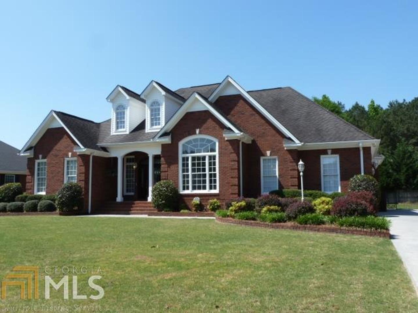 2 West Brook Drive Southwest Rome, GA 30165 - Photo 1 of 1 a front view of a house with a yard