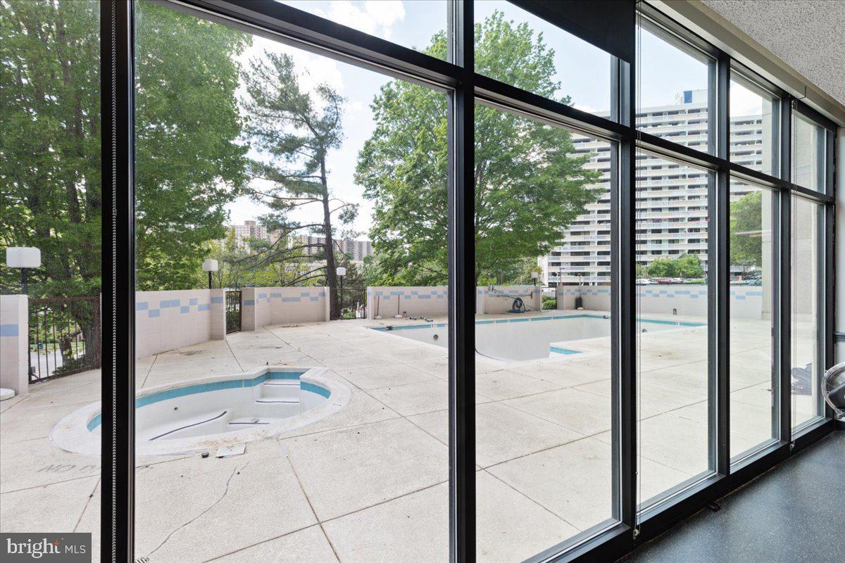 5911 Edsall Road, Unit 1104 Alexandria, VA 22304 - Photo 27 of 32 In Ground pool and jacuzzi - access from lower lev
