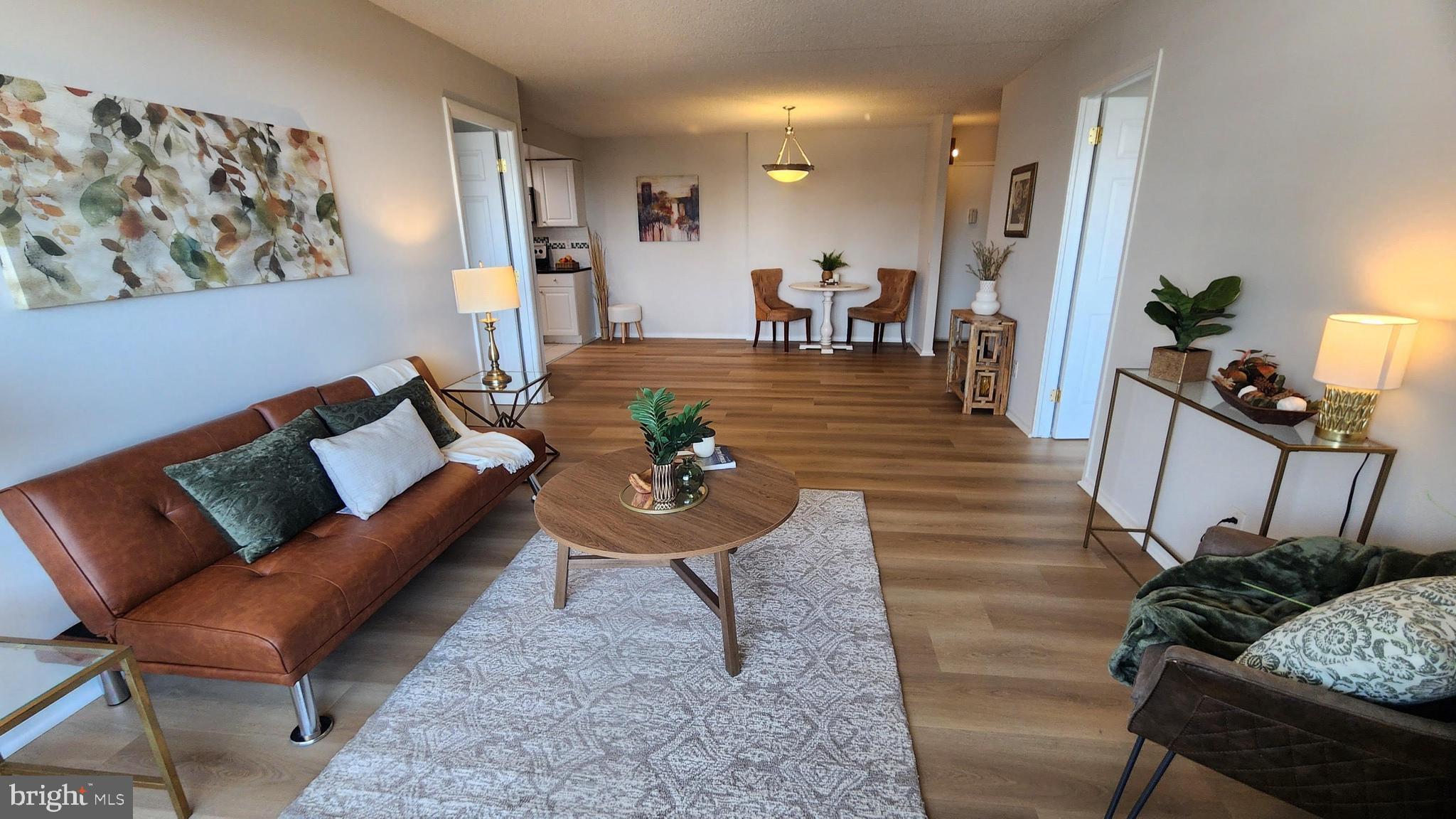 5911 Edsall Road, Unit 1104 Alexandria, VA 22304 - Photo 6 of 32 Open Living Area - New LVP Flooring throughout