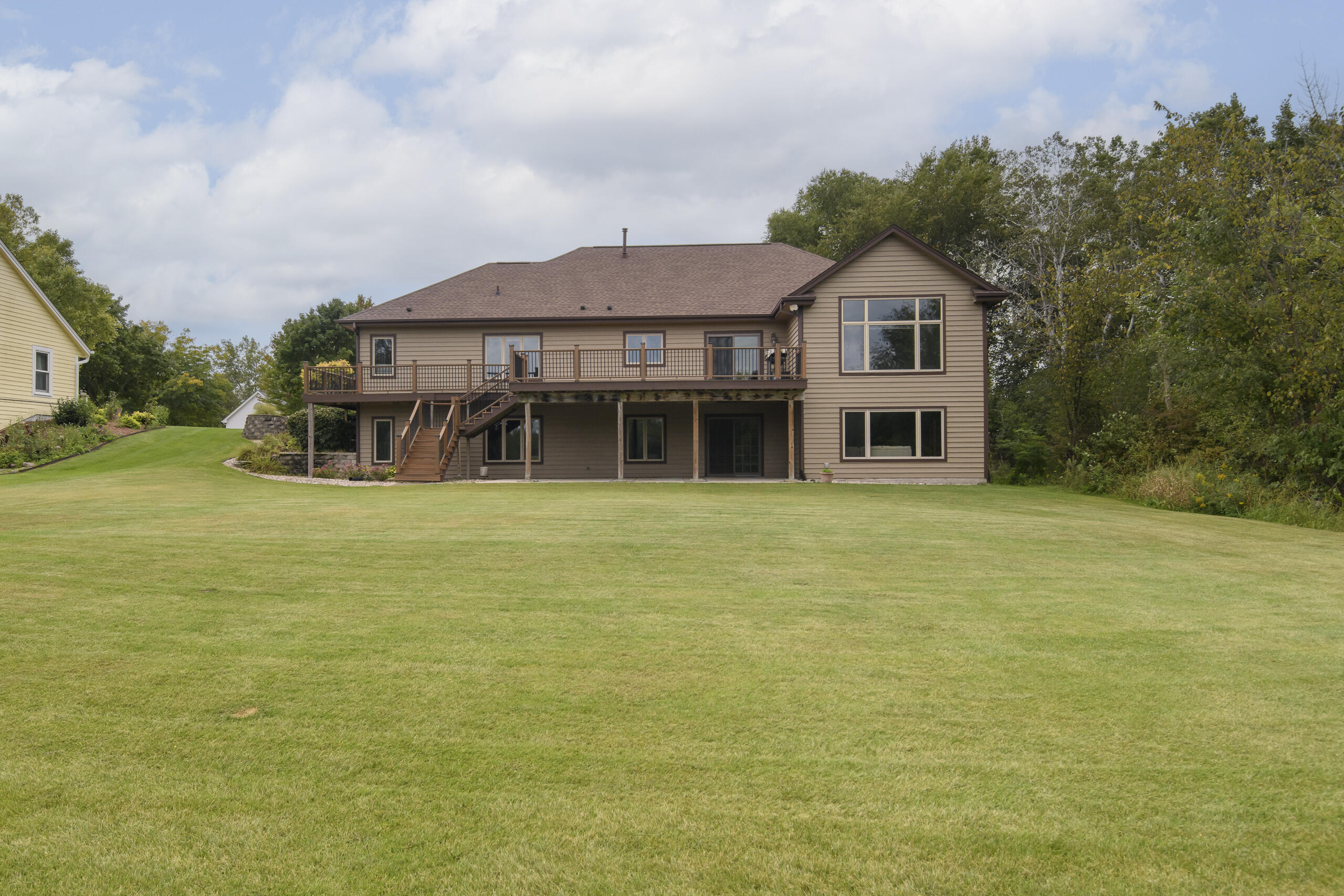 1326 Two Rivers Court Mukwonago, WI 53149 - Photo 51 of 66 Rear walk-out & expansive yard