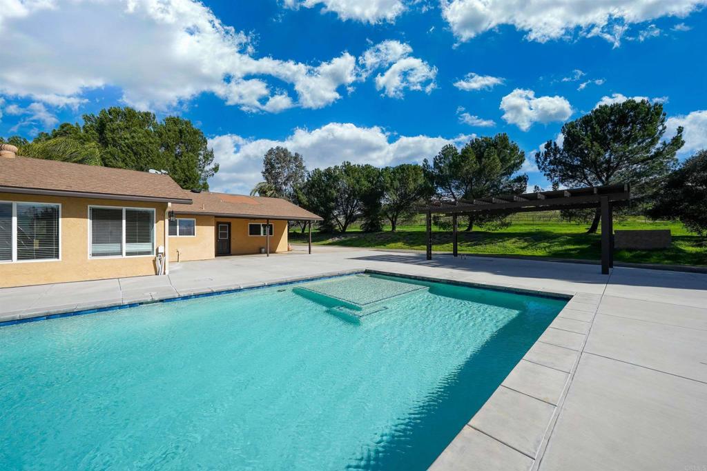 341 Pile Street Ramona, CA 92065 - Photo 41 of 50 a view of a house with swimming pool and sitting area