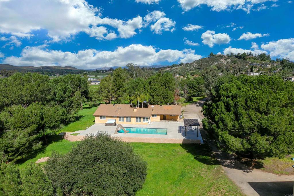 341 Pile Street Ramona, CA 92065 - Photo 45 of 50 a view of a house with a yard basket ball court and outdoor seating