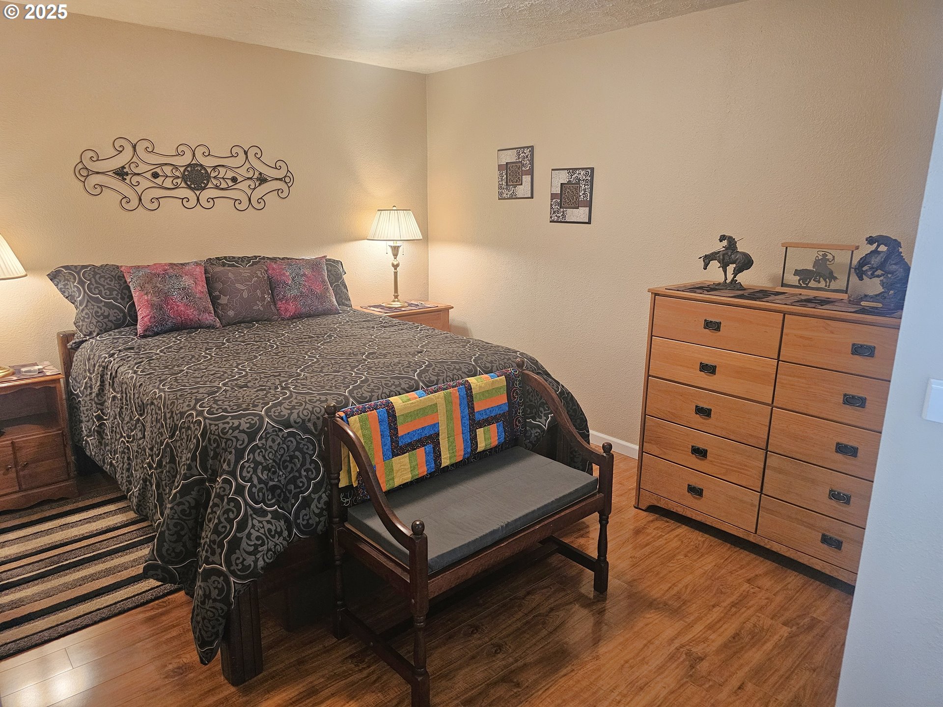 6481 Southwest Wren Lane Culver, OR 97734 - Photo 37 of 44 a bed room with a bed and a night stand