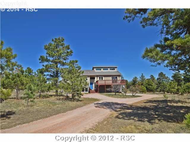 8660 Shoup Road Colorado Springs, CO 80908 - Photo 1 of 16 IMMACULATE BI-LEVEL, 4 BR, 3 BATH HOME WITH 3 CAR GARAGE BUILT IN1994, 2,772 SQ FT ON 5 BEAUTIFUL ACRES IN SCHOOL DISTRICT 20, LOCATED VERY CLOSE TO TOWN.