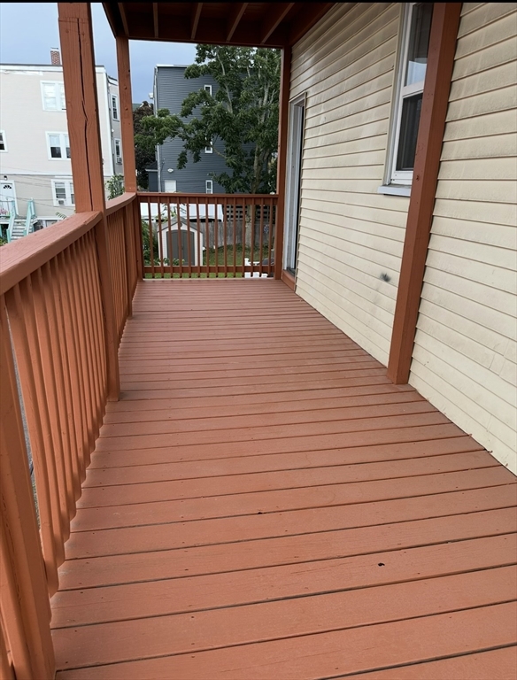 11 Tebroc Street, Unit 2 Boston, MA 02122 - Photo 17 of 17 a view of deck with wooden floor