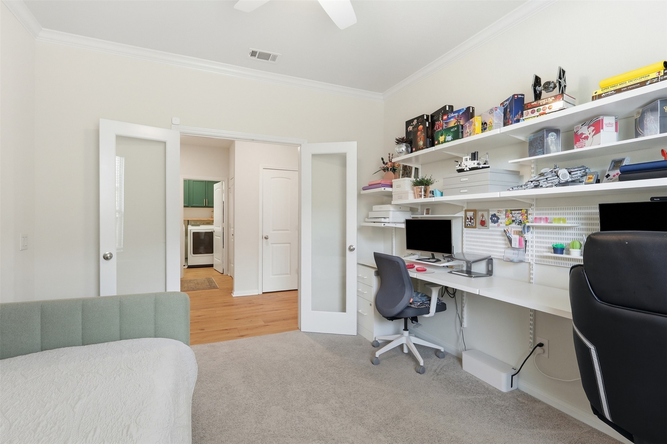 9739 Birdsnest Court Spring, TX 77379 - Photo 26 of 38 Another photo of this versatile flex room currently utilized as a home office, providing endless possibilities as a study, playroom, hobby space, or additional living area.
