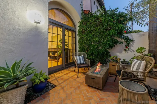 a building outdoor space with patio furniture