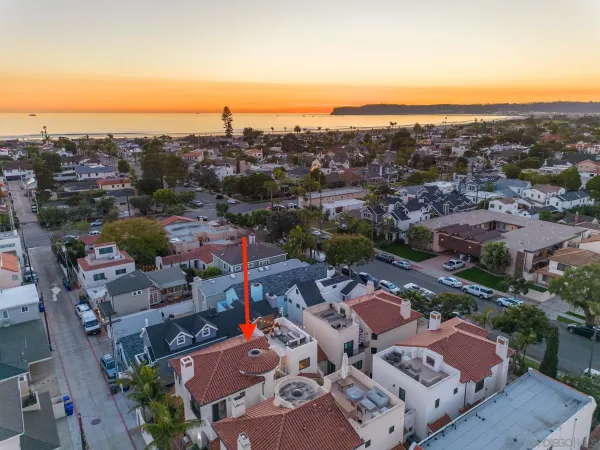 an aerial view of a city with lots of residential buildings