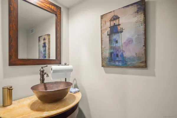 a bathroom with a toilet and a sink