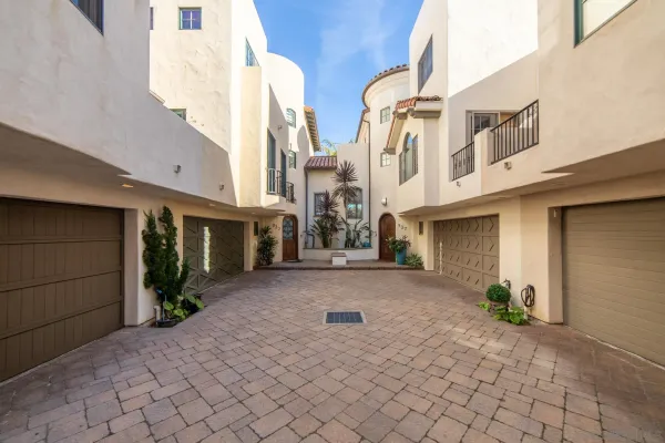 a view of a street with brick building