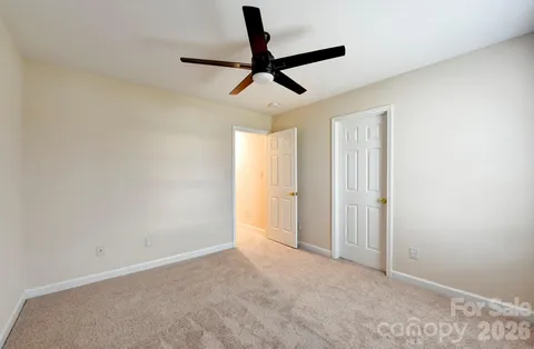 a view of a ceiling fan in a room