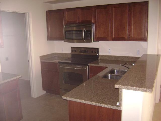 3330 South Gilbert Road, Unit 1006 Chandler, AZ 85286 - Photo 3 of 15 KITCHEN, GLG 03