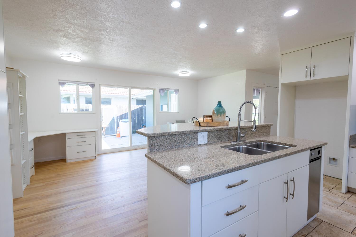 39 West Fulton Street Stockton, CA 95204 - Photo 11 of 31 a kitchen with counter top space sink and refrigerator