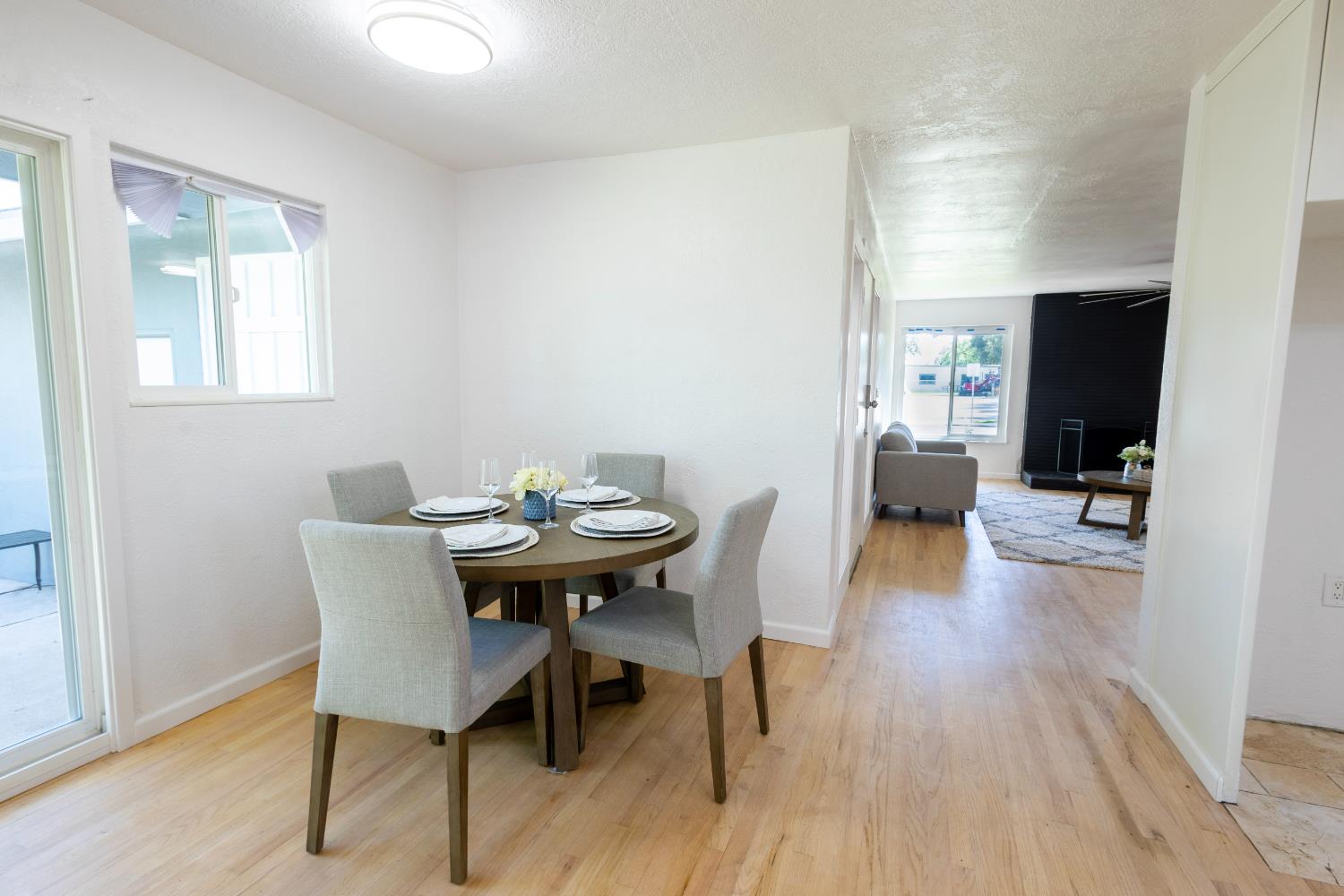 39 West Fulton Street Stockton, CA 95204 - Photo 12 of 31 a view of a dining room with furniture and wooden floor