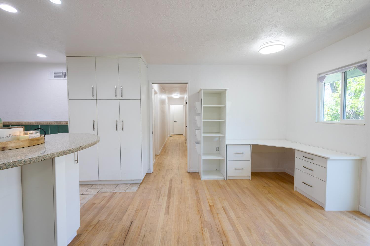 39 West Fulton Street Stockton, CA 95204 - Photo 13 of 31 a view of kitchen with wooden floor