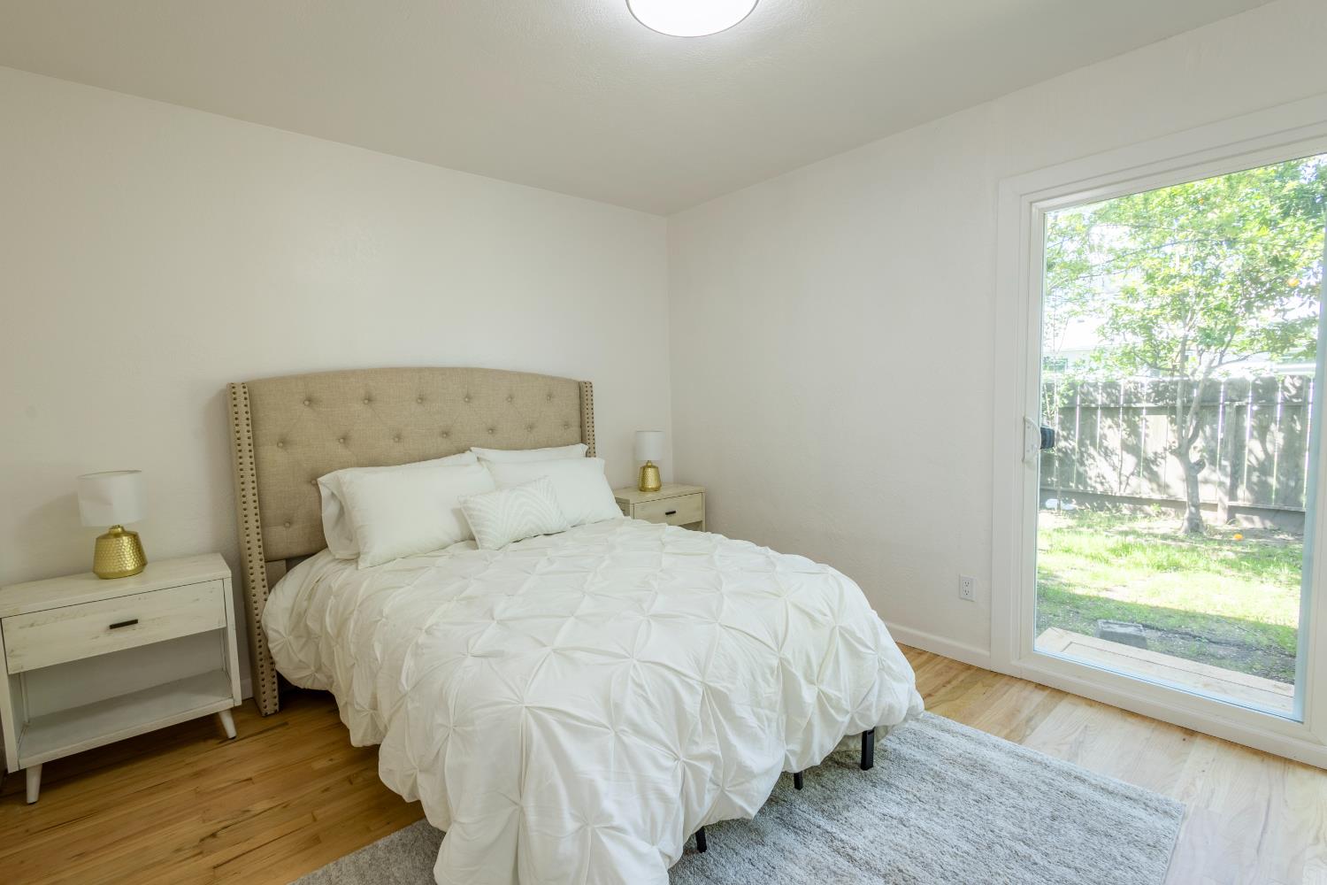 39 West Fulton Street Stockton, CA 95204 - Photo 20 of 31 a bedroom with a bed and a window