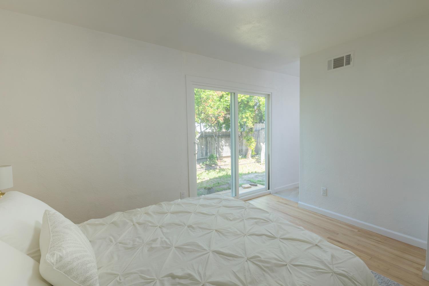 39 West Fulton Street Stockton, CA 95204 - Photo 22 of 31 a view of an empty room and window