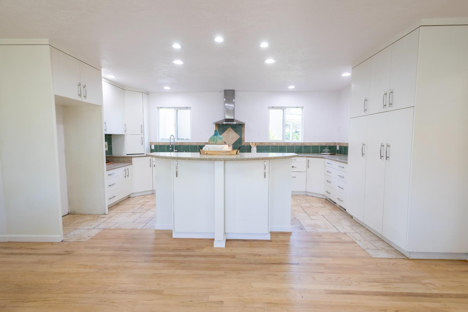 39 West Fulton Street Stockton, CA 95204 - Photo 6 of 31 a kitchen with granite countertop a sink and cabinets