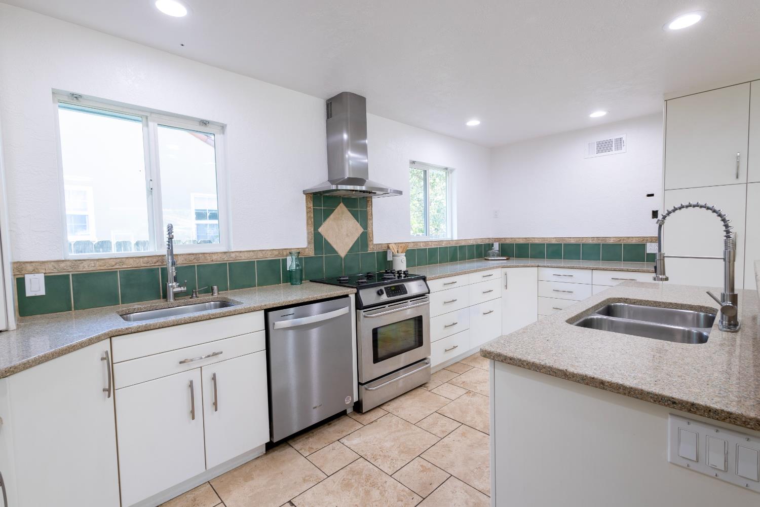 39 West Fulton Street Stockton, CA 95204 - Photo 8 of 31 a kitchen with a sink and cabinets