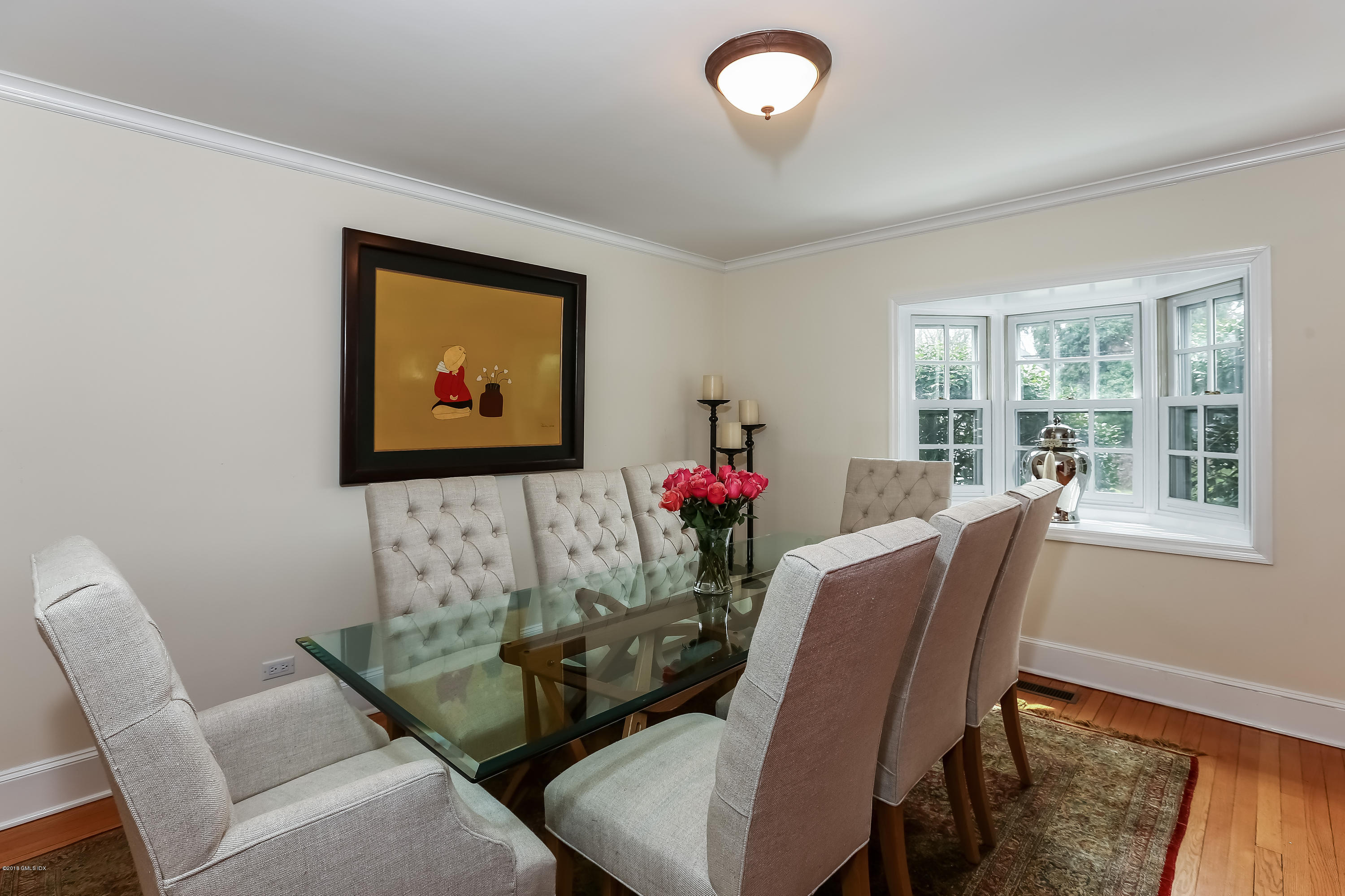 21 Knoll Street Riverside, CT 06878 - Photo 6 of 35 a living room with furniture and a potted plant