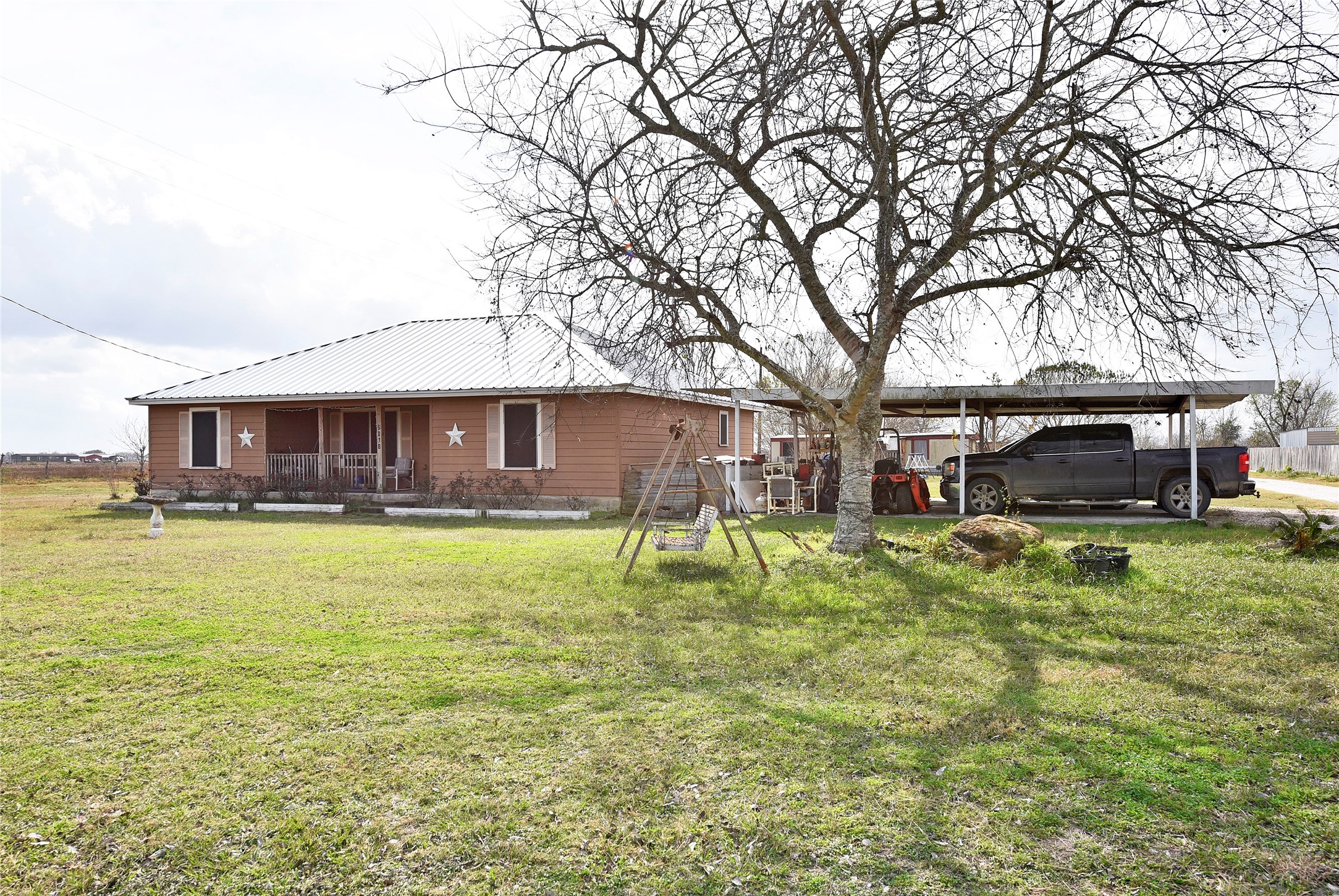 6018 FM 360 Road Needville, TX 77461 - Photo 12 of 50 a swimming pool with outdoor seating and yard