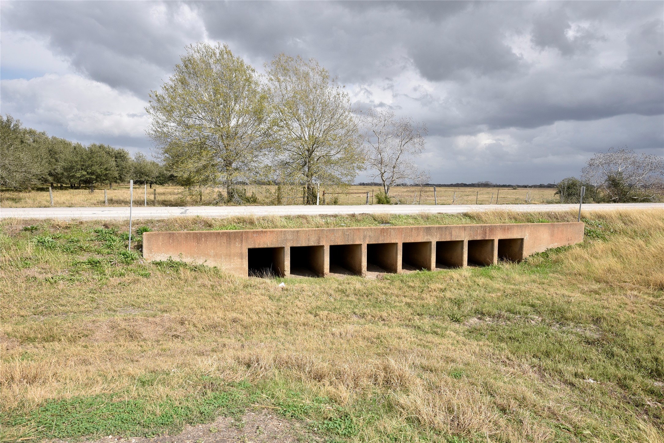 6018 FM 360 Road Needville, TX 77461 - Photo 16 of 50 a view of house with yard and ocean view