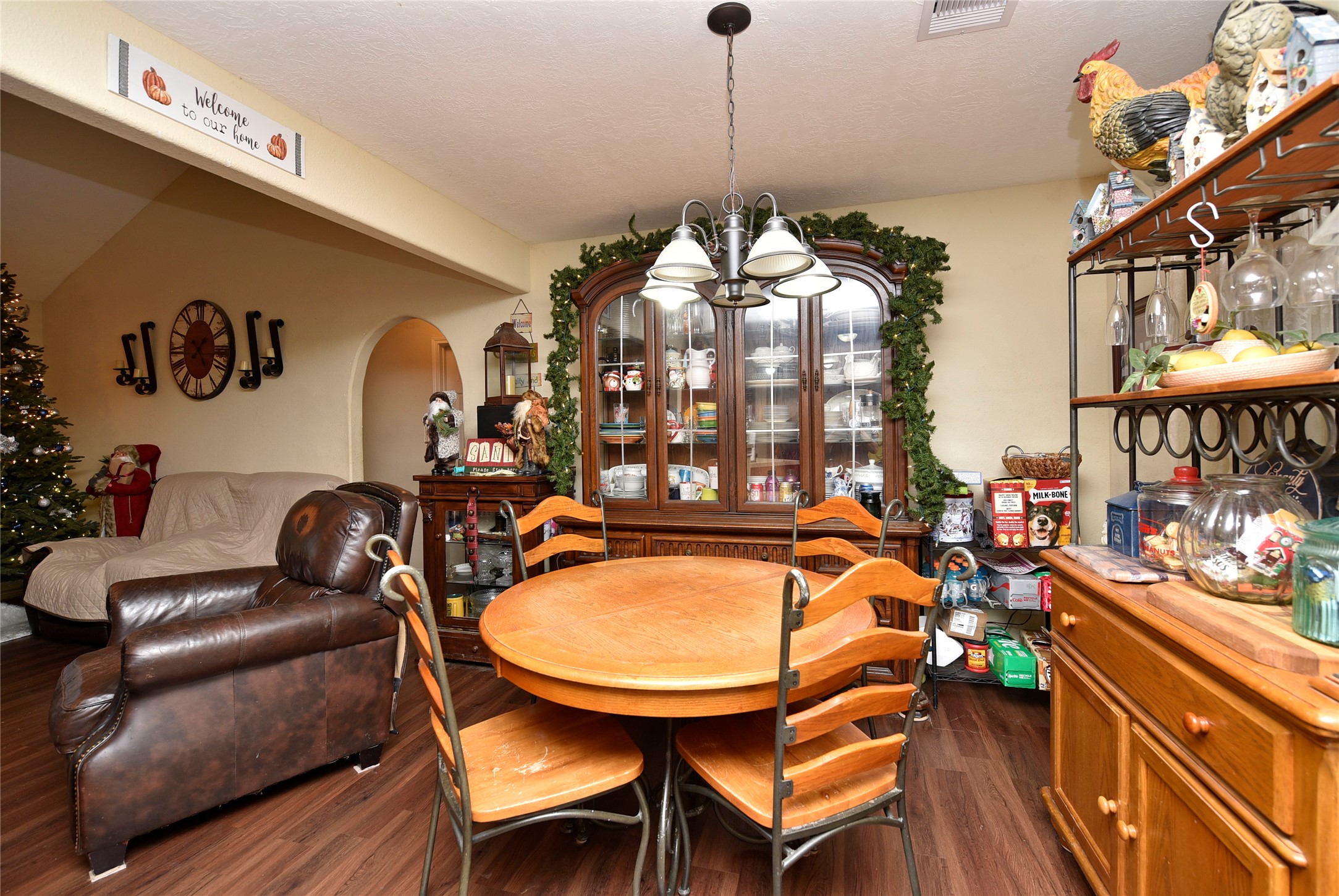 6018 FM 360 Road Needville, TX 77461 - Photo 21 of 50 a view of a dining room with furniture and chandelier