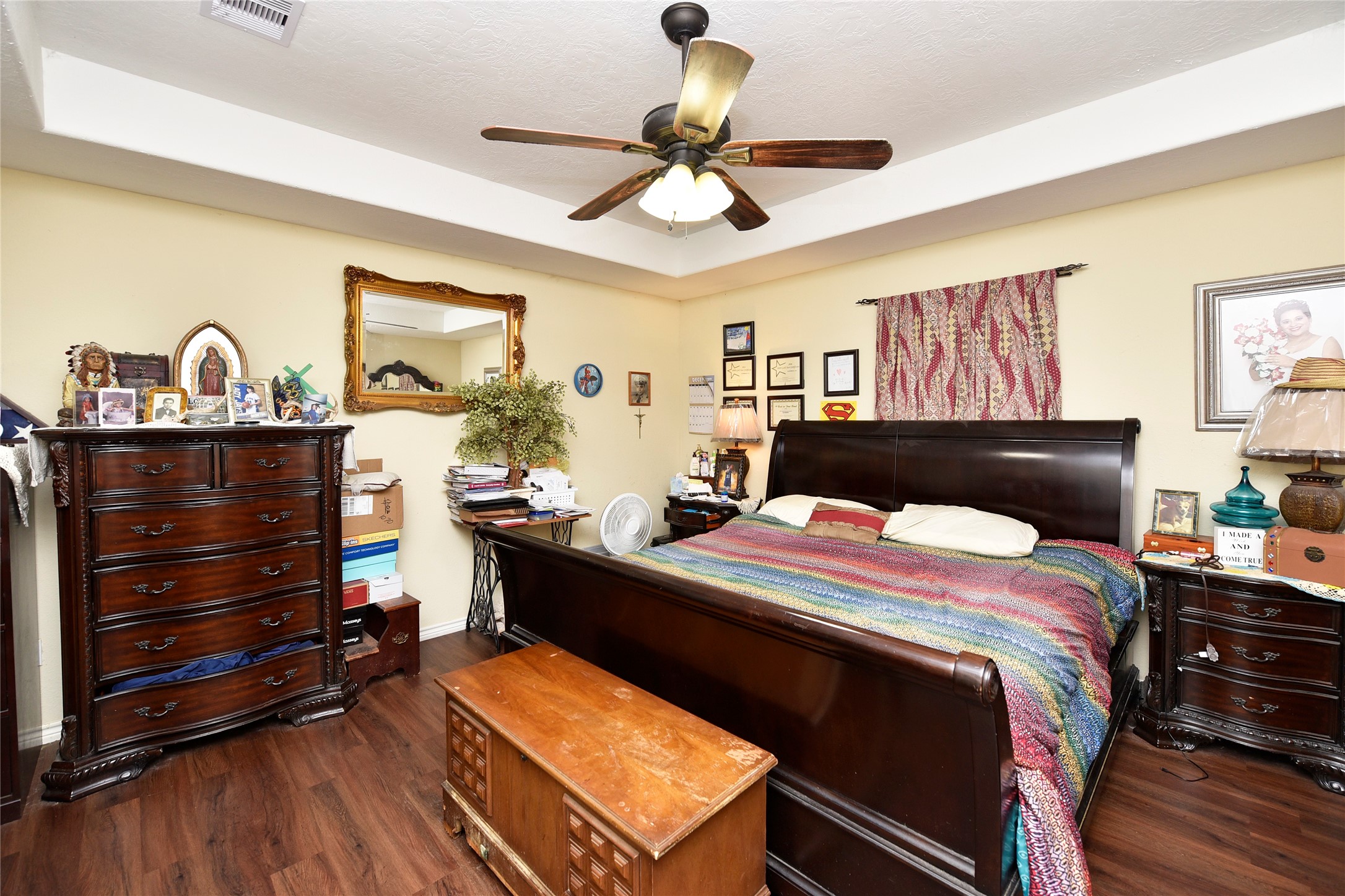 6018 FM 360 Road Needville, TX 77461 - Photo 23 of 50 a bed room with a bed and a chandelier