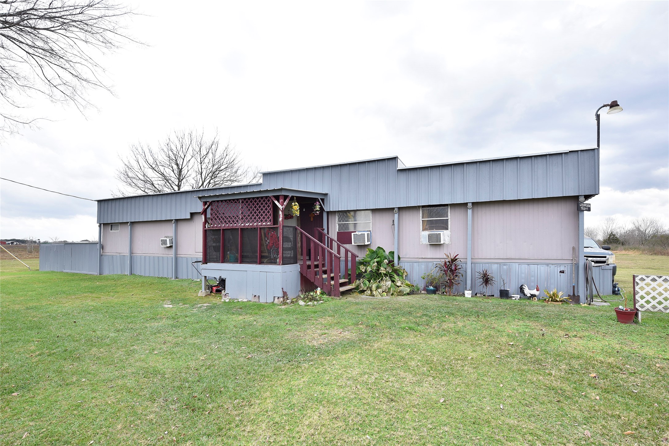 6018 FM 360 Road Needville, TX 77461 - Photo 38 of 50 a front view of house with yard